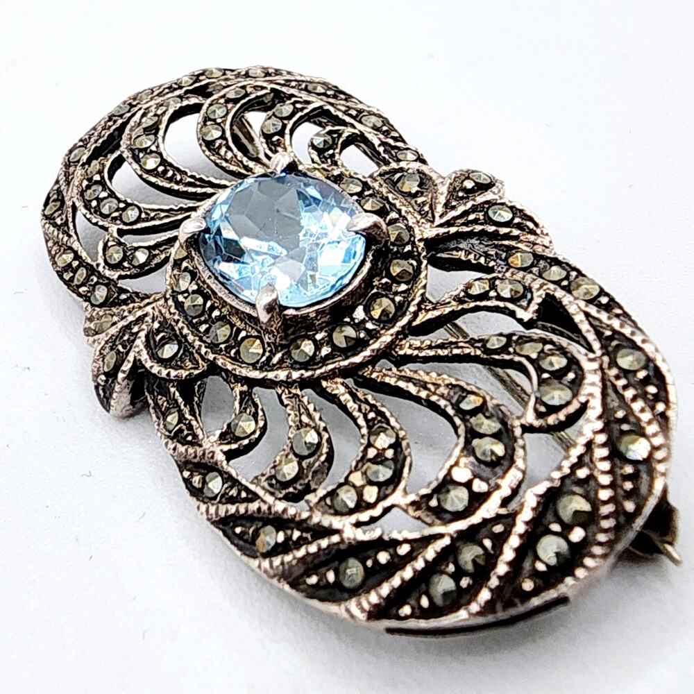 Art Deco Sterling Silver Sky Blue Topaz and Marcasite Filigree Brooch c 1920s